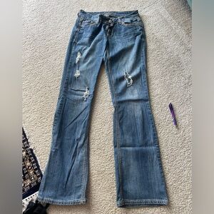 Premier Distressed Curvy Bootcut Jeans
